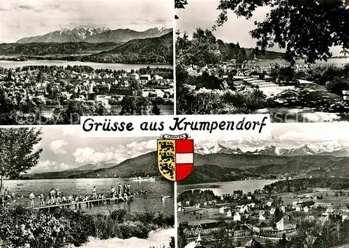 AK / Ansichtskarte Krumpendorf Woerthersee Gesamtansicht mit Alpenpanorama Badestrand Steg