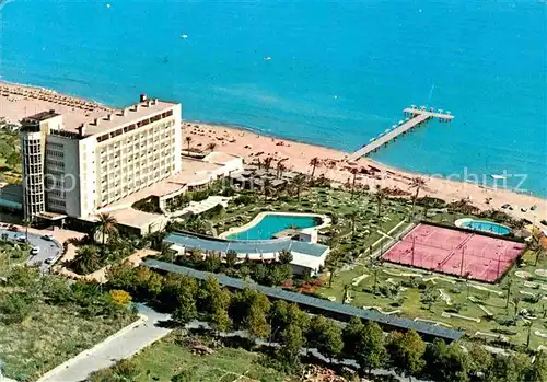 AK / Ansichtskarte Torremolinos Hotel Pez Espada Swimming Pool Tennis Strand Fliegeraufnahme Kat. Malaga Costa del Sol