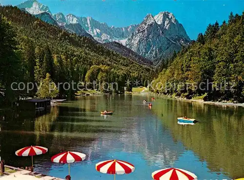 AK / Ansichtskarte Garmisch Partenkirchen Riessersee Bootfahren Alpenblick Kat. Garmisch Partenkirchen