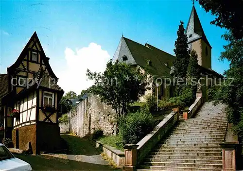 AK / Ansichtskarte Bad Orb Kleinstes Haus mit Pfarrkirche St Martin Fachwerk Kat. Bad Orb