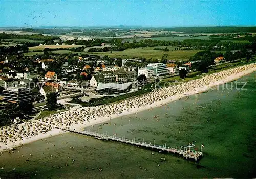 AK / Ansichtskarte Scharbeutz Ostseebad Fliegeraufnahme mit Strand und Seebruecke Kat. Scharbeutz