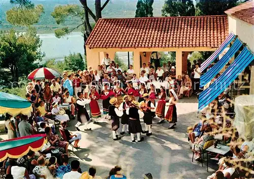 AK / Ansichtskarte Korfu Corfu Volkstanz Tracht Musikgruppe im Restaurant Kat. Griechenland