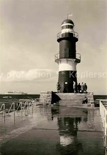 AK / Ansichtskarte Leuchtturm Lighthouse Warnemuende An der Mole  Kat. Gebaeude