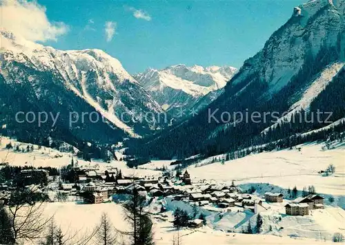 AK / Ansichtskarte Berguen Bravuogn GR Gesamtansicht mit Alpenpanorama im Winter Kat. Berguen