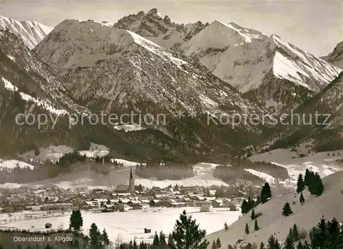AK / Ansichtskarte Oberstdorf Gesamtansicht mit Alpenpanorama im Winter Kat. Oberstdorf