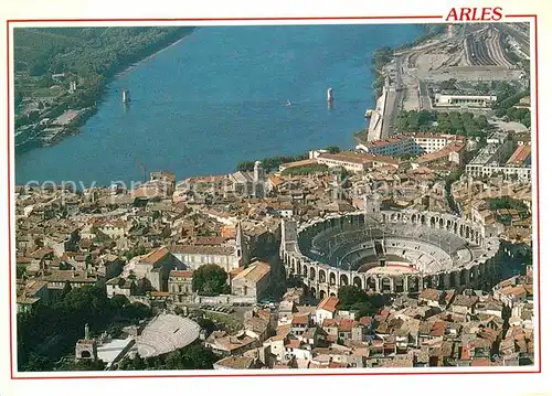 AK / Ansichtskarte Arles Bouches du Rhone Les Arenes Theatre Antique et le Rhone vue aerienne Collection Reflets de Provence Kat. Arles