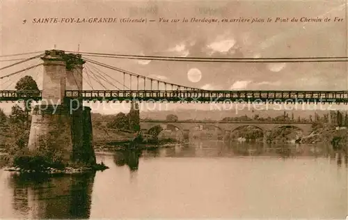 AK / Ansichtskarte Sainte Foy la Grande Vue sur la Dordogne en arriere plan le Pont du Chemin de Fer Kat. Sainte Foy la Grande