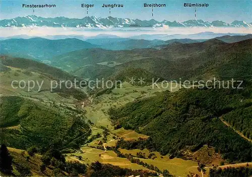 AK / Ansichtskarte Schoenau Schwarzwald Fliegeraufnahme mit Jungfrau Eiger Breithorn Bluemlisalp Kat. Schoenau im Schwarzwald