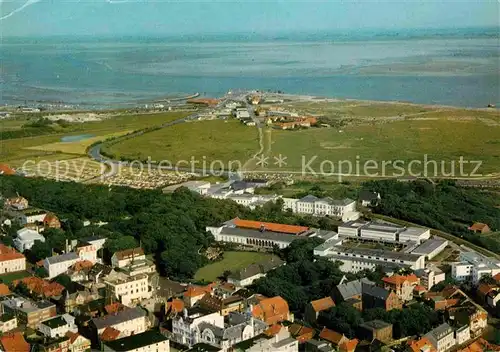 AK / Ansichtskarte Norderney Nordseebad Fliegeraufnahme Kuranlagen und Hafen Kat. Norderney