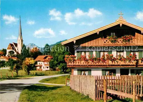 AK / Ansichtskarte Bad Wiessee Blumenschmuck Ortspartie an der Kirche mit Kampen Bayerische Voralpen Kat. Bad Wiessee