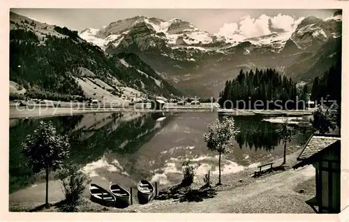 AK / Ansichtskarte Lenk Simmental Panorama mit Blick zum Wildstrubel Berner Alpen Uferweg am See Kat. Lenk Simmental