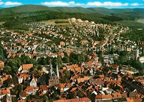 AK / Ansichtskarte Alfeld Leine Stadtbild mit Kirche Fliegeraufnahme Kat. Alfeld (Leine)