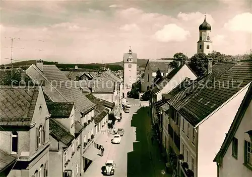 AK / Ansichtskarte Isny Allgaeu Wassertorstrasse mit Wassertor und St Nikolauskirche Kat. Isny im Allgaeu