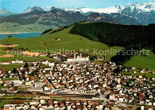 AK / Ansichtskarte Einsiedeln SZ Kloster Sihlsee und Glarner Alpen Fliegeraufnahme Kat. Einsiedeln