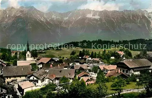 AK / Ansichtskarte Igls Tirol Ortsansicht mit Kirche Alpenpanorama Kat. Innsbruck