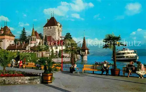 AK / Ansichtskarte Oberhofen Thunersee Schloss Uferpromenade Dampfer Kat. Oberhofen Thunersee