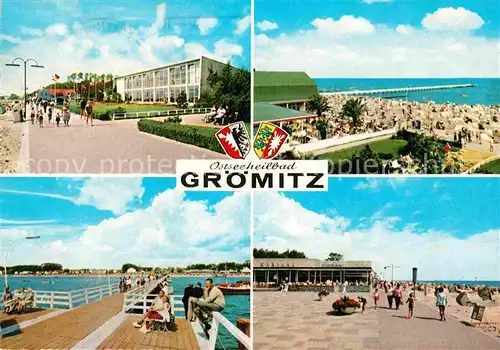 AK / Ansichtskarte Groemitz Ostseebad Promenade Strand Seebruecke Kat. Groemitz