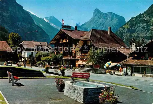 AK / Ansichtskarte Kandersteg BE Dorfbrunnen Blick zum Rinderhorn Gellihorn Berner Alpen Kat. Kandersteg