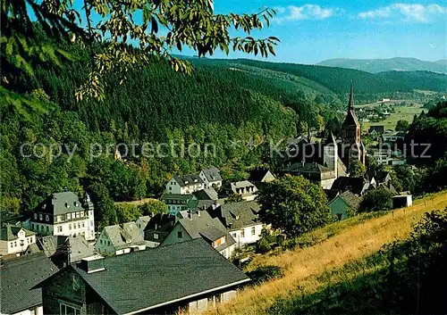 AK / Ansichtskarte Kirchhundem Ortsansicht mit Kirche Landschaftspanorama Kat. Kirchhundem Hochsauerland