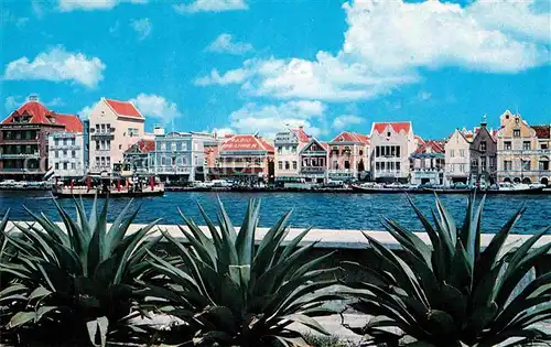 AK / Ansichtskarte Curacao Niederlaendische Antillen Buildings lining waterfront typical old Dutch architecture Kat. Niederlaendische Antillen