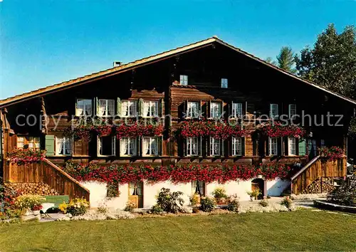 AK / Ansichtskarte Gstaad Chalet Blumenschmuck Berner Oberland Kat. Gstaad