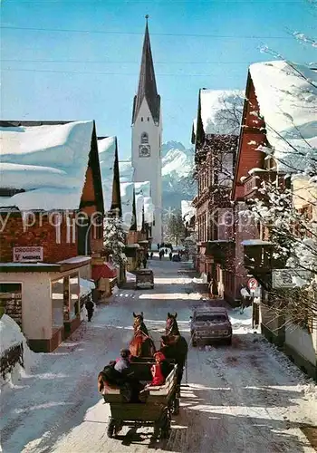 AK / Ansichtskarte Oberstdorf Kirchstrasse Pferdewagen Kirche Allgaeuer Alpen im Winter Kat. Oberstdorf