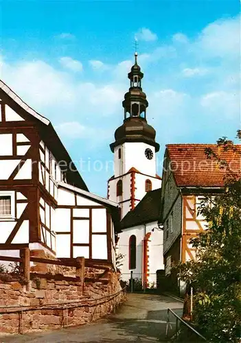 AK / Ansichtskarte Bad Salzschlirf Partie an der Kirche Fachwerkhaeuser Kat. Bad Salzschlirf