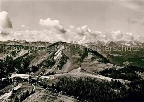 AK / Ansichtskarte Rottach Egern Wallbergbahn Bergstation und Hotel mit Wallbergkapelle Fliegeraufnahme Kat. Rottach Egern