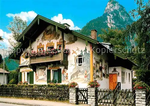 AK / Ansichtskarte Oberammergau Passionsspieldorf Rotkaeppchen Haus Fassadenmalerei Kofel Ammergauer Alpen Kat. Oberammergau