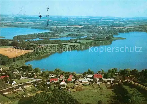 AK / Ansichtskarte Niederkleveez Fliegeraufnahme mit Dieksee Langensee Behler See Timmendorf Kat. Boesdorf