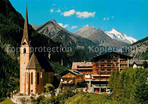 AK / Ansichtskarte Heiligenblut Kaernten Hotel Glocknerhof Haus Hubertus Kirche Kat. Heiligenblut