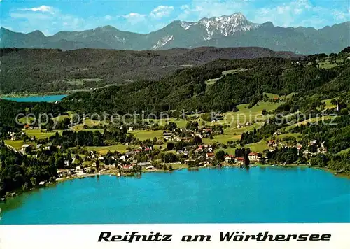 AK / Ansichtskarte Reifnitz Woerthersee mit Mittagskogel Karawanken Fliegeraufnahme Kat. Maria Woerth