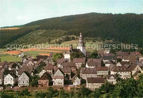 AK / Ansichtskarte Hallenberg Ortsansicht mit Kirche Fachwerkhaeuser Kat. Hallenberg