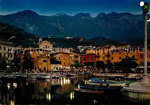AK / Ansichtskarte Malcesine Lago di Garda Abendstimmung Bootsanlegestelle Kat. Malcesine