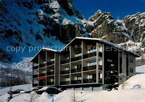 AK / Ansichtskarte Leukerbad Appartementhaus Belair im Winter Alpen Kat. Loeche les Bains