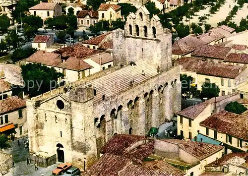 AK / Ansichtskarte Saintes Maries de la Mer Basilique fortifiee XI siecle vue aerienne