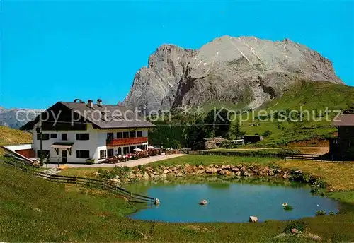 AK / Ansichtskarte Alpe di Siusi Rifugio Molignon Gruppo Sassolungo Berghaus Langkofelgruppe Dolomiten Kat. Seiser Alm Dolomiten