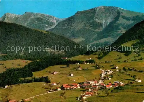 AK / Ansichtskarte Steibis Bergdorf mit Hochgrat Rindalphorn Allgaeuer Alpen Fliegeraufnahme Kat. Oberstaufen