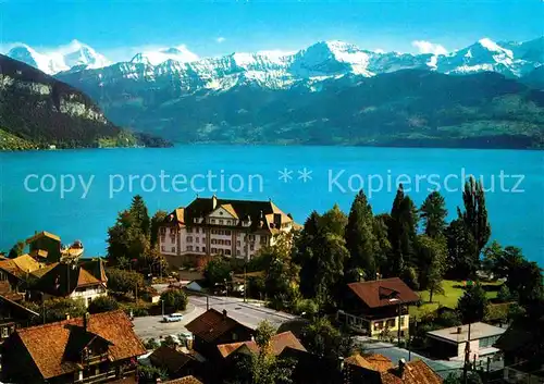 AK / Ansichtskarte Gunten Thunersee Parkhotel mit Blick zu Eiger Moench und Jungfrau Berner Alpen