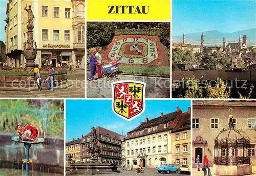 AK / Ansichtskarte Zittau Rolandbrunnen Blumenuhr Teilansicht Schleifermaennchen August Bebel Platz Herkulesbrunnen Gruener Born Stadtmuseum Kat. Zittau