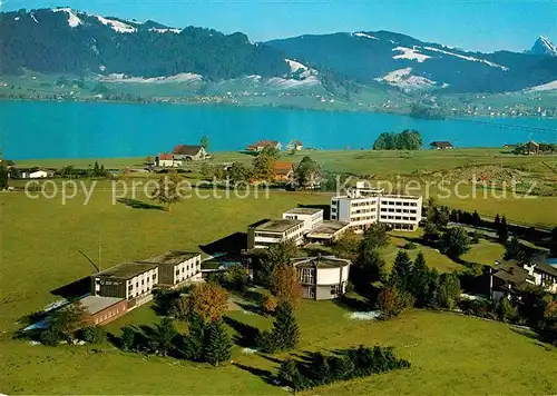 AK / Ansichtskarte Einsiedeln SZ Schweizer Jugend und Bildungszentrum am Sihlsee Alpen Fliegeraufnahme Kat. Einsiedeln