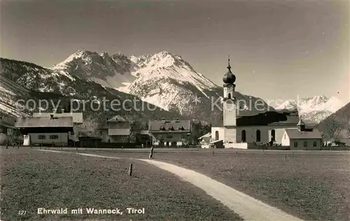 AK / Ansichtskarte Ehrwald Tirol Ortsansicht mit Kirche Blick gegen Wanneck Mieminger Kette