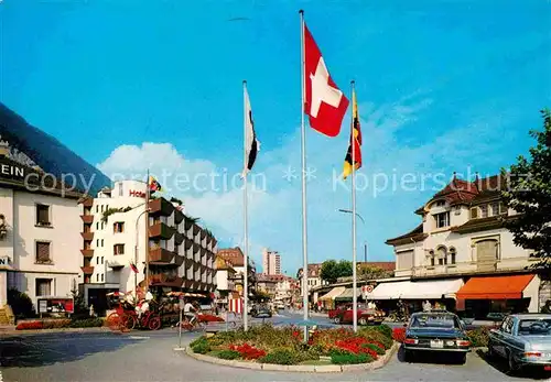 AK / Ansichtskarte Interlaken BE Bahnhofstrasse Fahnen Kat. Interlaken