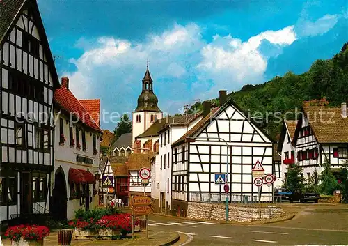 AK / Ansichtskarte Heimbach Eifel Ortsmotiv mit Kirche Fachwerkhaeuser Luftkurort Kat. Heimbach