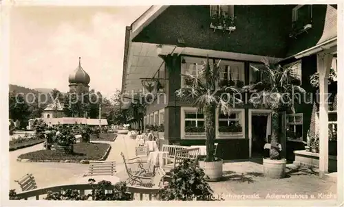 AK / Ansichtskarte Hinterzarten Adlerwirtshaus mit Kirche Kat. Hinterzarten