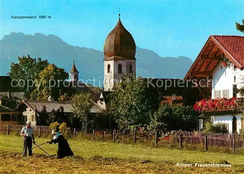 AK / Ansichtskarte Frauenchiemsee Kloster mit Kampenwand Heuernte Kat. Chiemsee