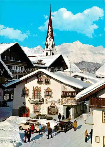 AK / Ansichtskarte Seefeld Tirol Ortsmotiv im Winter mit Tiroler Schmuckkastl Wettersteingebirge Kat. Seefeld in Tirol