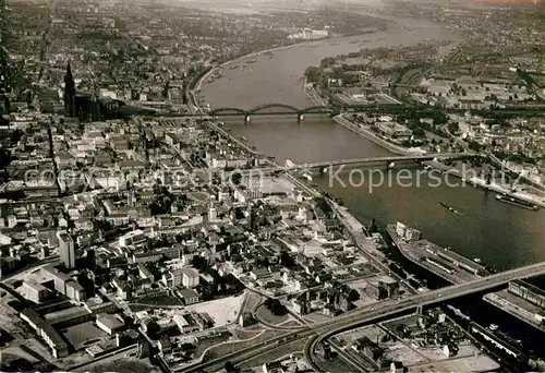 AK / Ansichtskarte Koeln Rhein Fliegeraufnahme Dom Hohenzollernbruecke Deutzer Bruecke Severinsbruecke Kat. Koeln