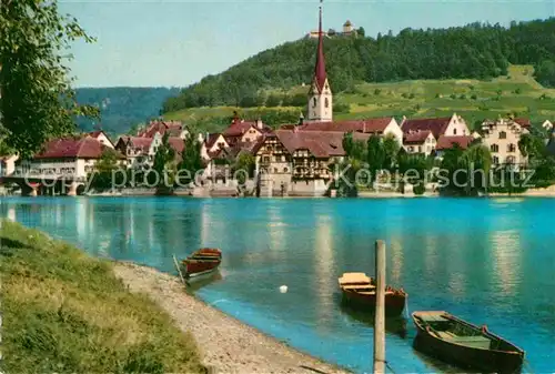 AK / Ansichtskarte Stein Rhein Uferpartie am Rhein Boote Ortsansicht mit Kirche Kat. Stein Rhein