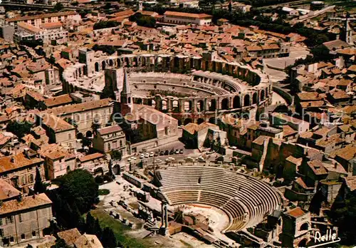 AK / Ansichtskarte Arles Bouches du Rhone Vue aerienne sur le Theatre Antique et les Arenes Romaines Kat. Arles